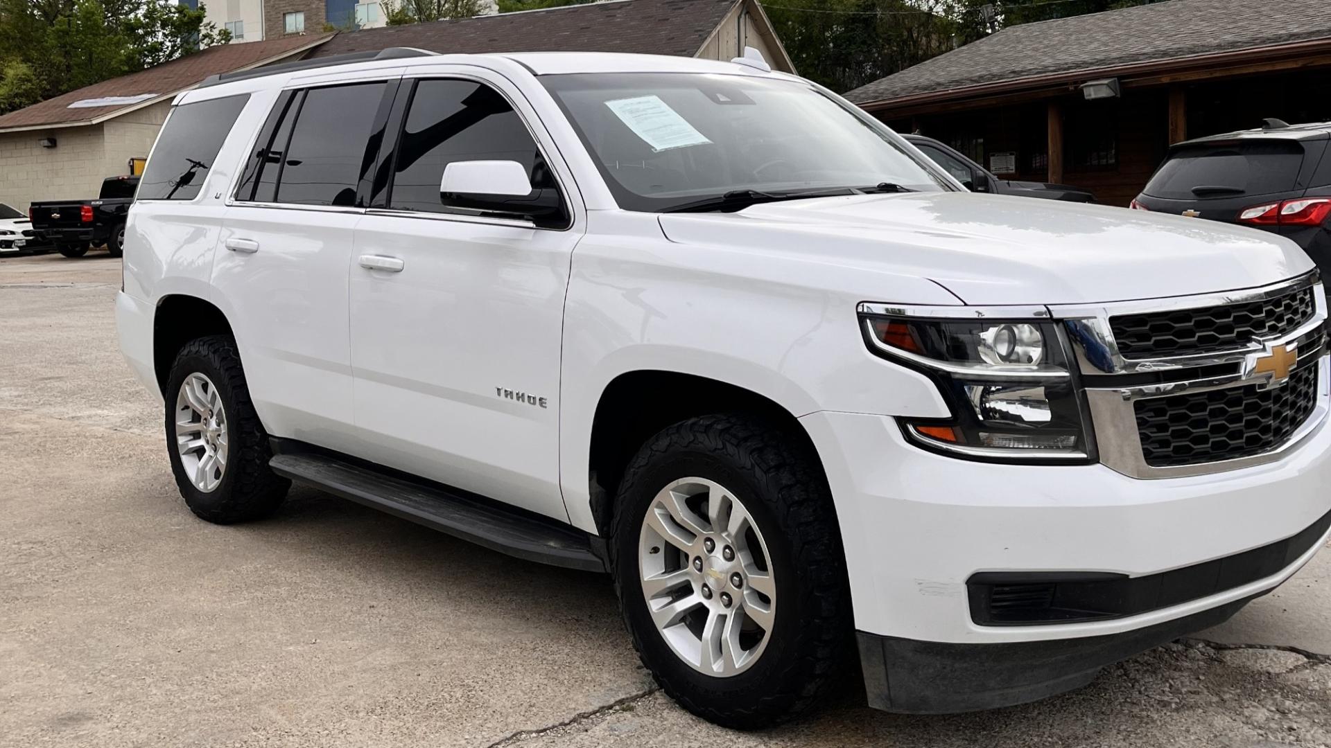 2018 white Chevrolet Tahoe LT 2WD (1GNSCBKC5JR) with an 5.3L V8 OHV 16V engine, 6A transmission, located at 945 E. Jefferson Blvd, Dallas, TX, 75203, (214) 943-7777, 32.752514, -96.811630 - Photo#2